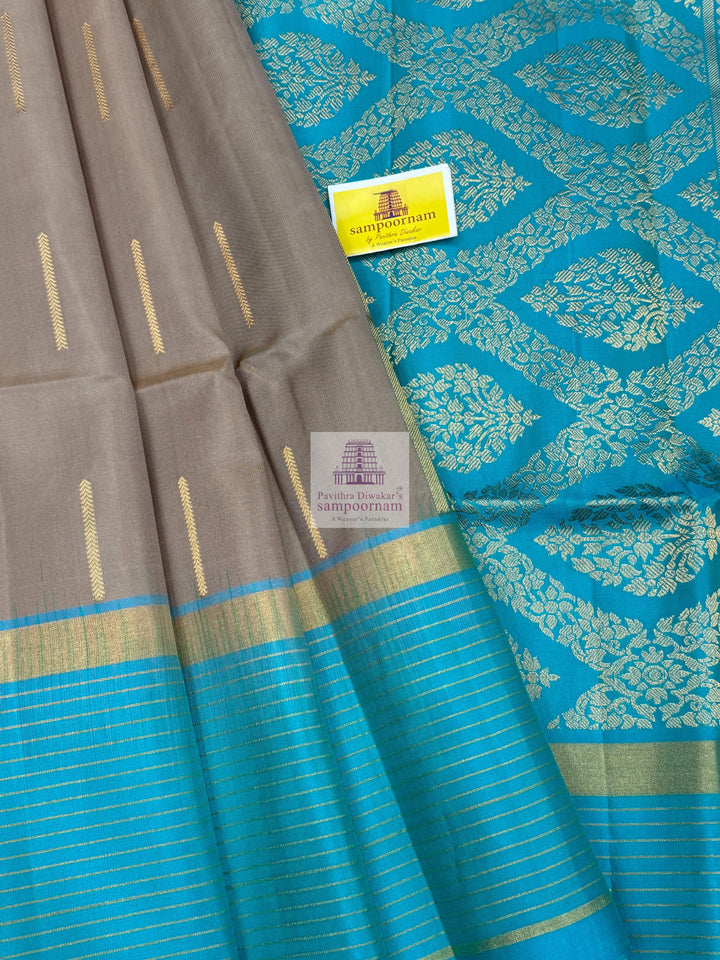 Dark Beige with Turquoise Blue , Zari lines in the border and Zari butta in the body  and rich Pallu Pure Soft Silk Saree