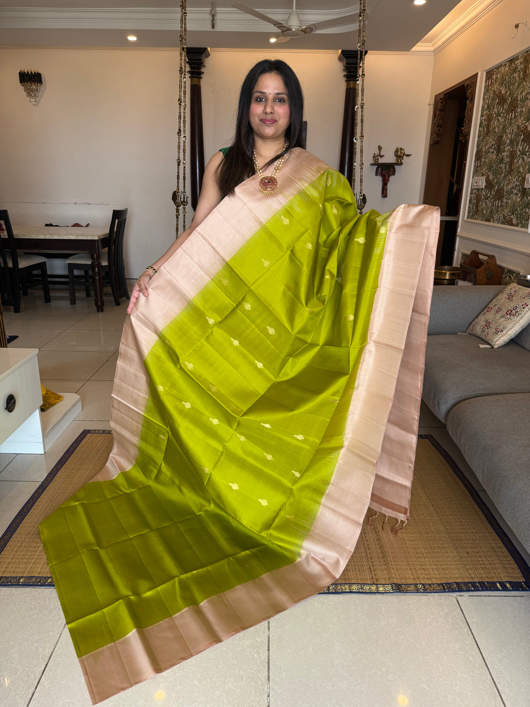 Light Green with Beige rich zari butta in the body , plain borders and rich Pallu , pure soft silk saree