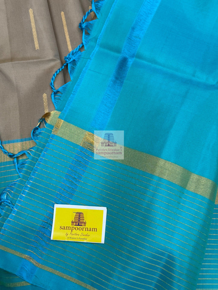 Dark Beige with Turquoise Blue , Zari lines in the border and Zari butta in the body  and rich Pallu Pure Soft Silk Saree