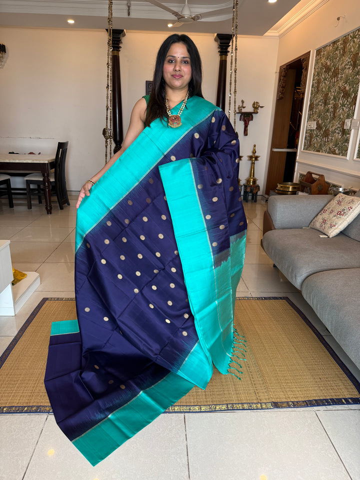 Dark Blue with Light Blue , rich zari rudraksh butta in the body and  grand Pallu , pure soft silk saree