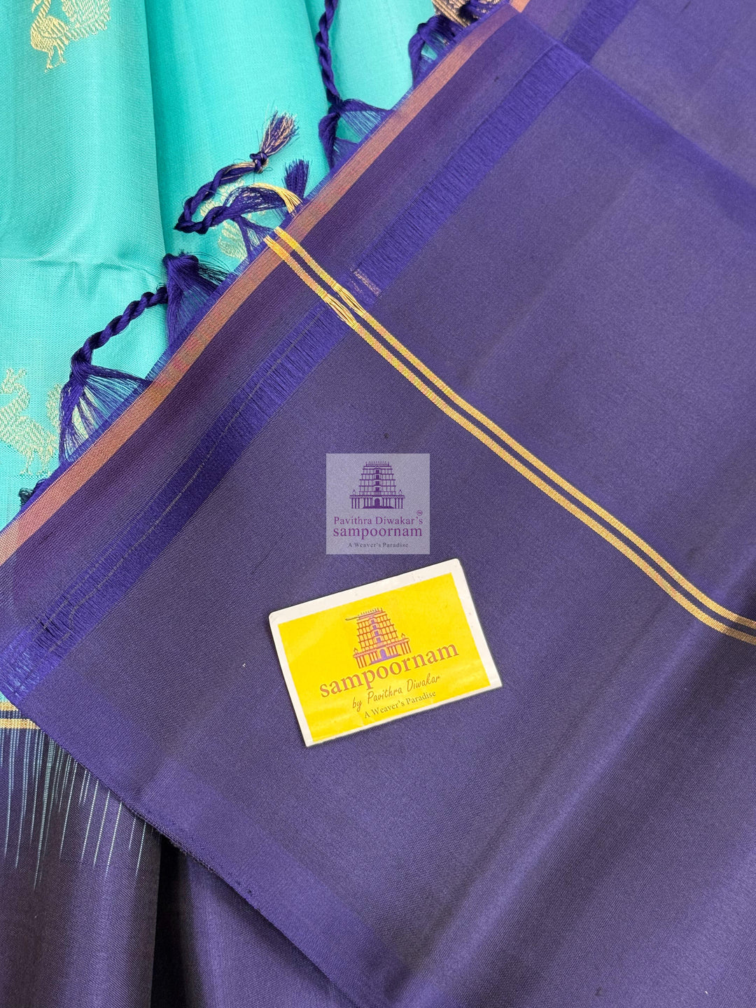 Blue with Dark Blue ,  Vairaoosi lines in the border , Annam and Floral butta in the body and rich Pallu Pure Soft Silk Saree