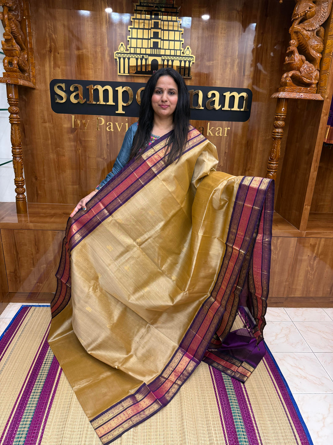 Light Gold with Purple , Rich Mango Zari butta in the body and Traditional Kanchi borders & rich Pallu Korvai Silk Cotton Saree