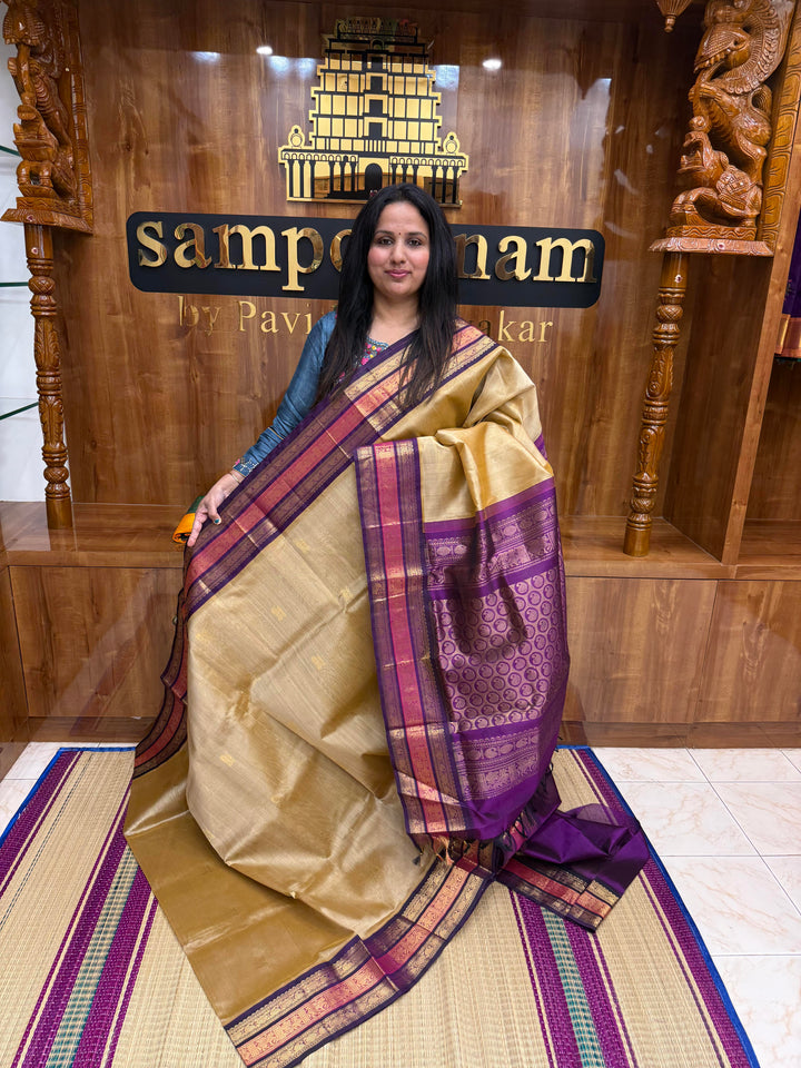 Light Gold with Purple , Rich Mango Zari butta in the body and Traditional Kanchi borders & rich Pallu Korvai Silk Cotton Saree
