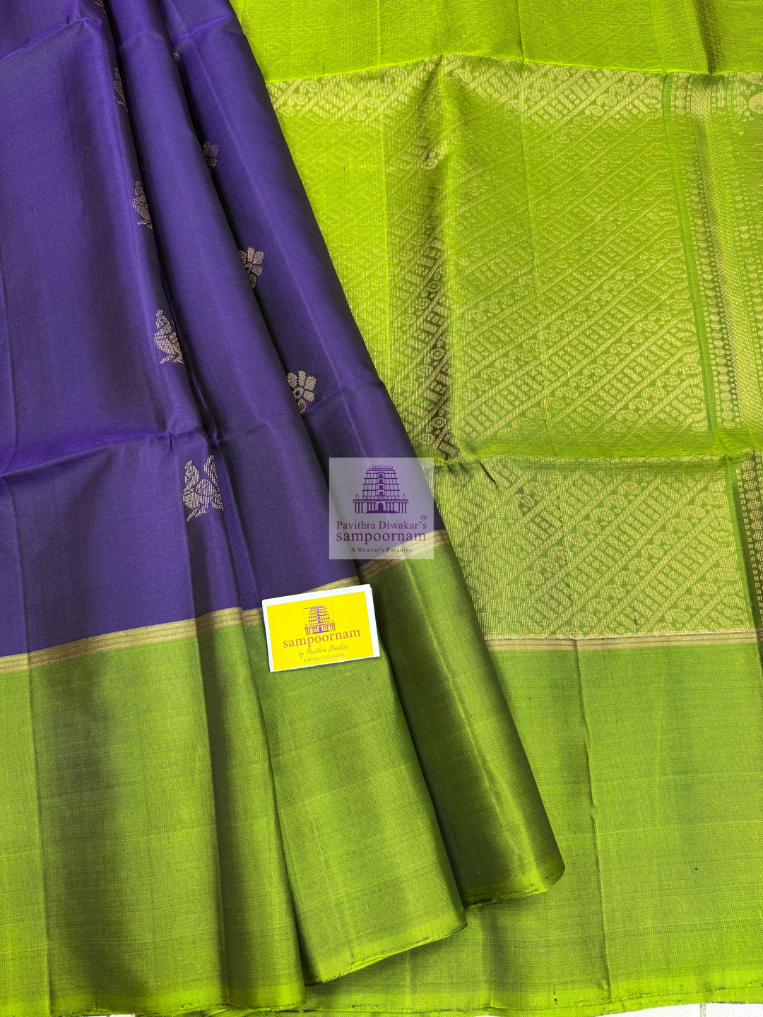 Purple with Olive Green ,  Annam and Floral butta in the body and rich Pallu Pure Soft Silk Saree