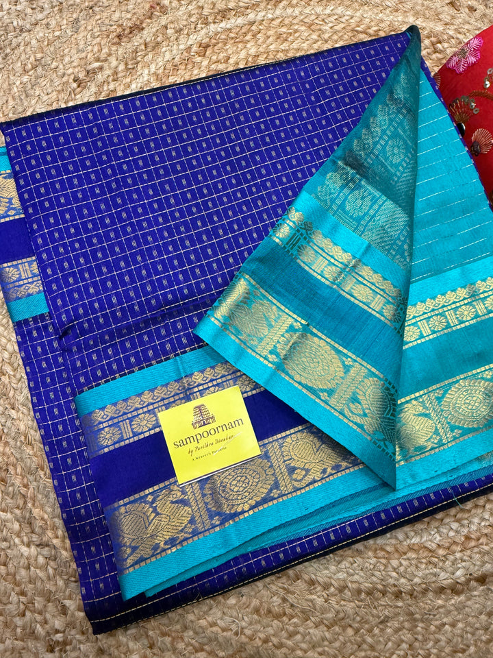 Blue with Turquoise Blue , Zari  butta in the body , rettapet  border and rich Pallu Lakshadeepam Silk Cotton Saree