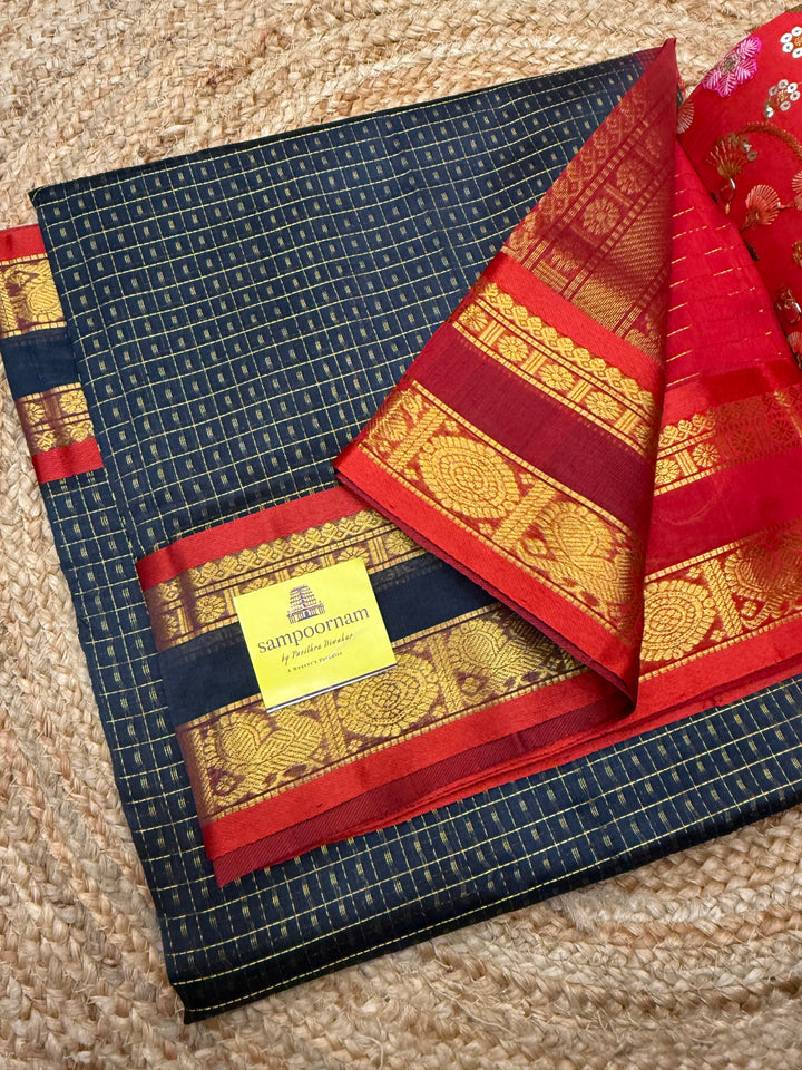 Dark Blue with Red , Zari  butta in the body , rettapet border and rich Pallu Lakshadeepam Silk Cotton Saree