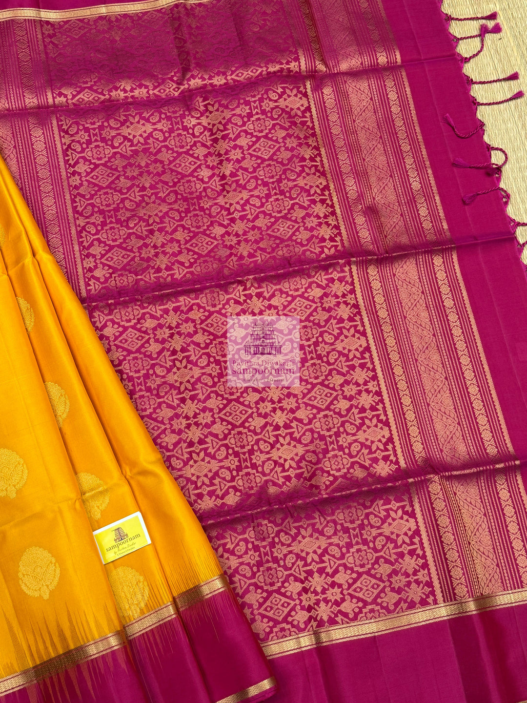 Mambazha Manjal with Rani Pink  , rich Zari butta in the body , rettapet boder  and grand  Pallu Pure Soft Silk Saree