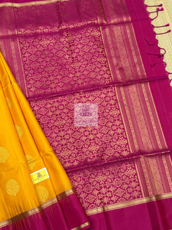 Mambazha Manjal with Rani Pink  , rich Zari butta in the body , rettapet boder  and grand  Pallu Pure Soft Silk Saree