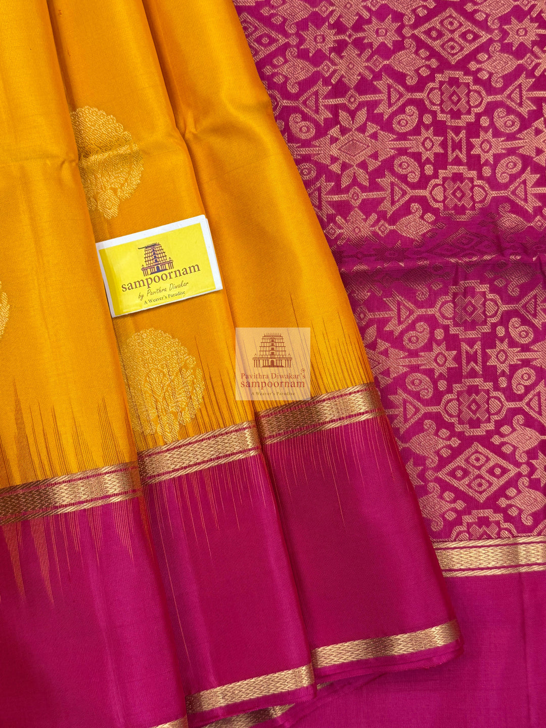 Mambazha Manjal with Rani Pink  , rich Zari butta in the body , rettapet boder  and grand  Pallu Pure Soft Silk Saree