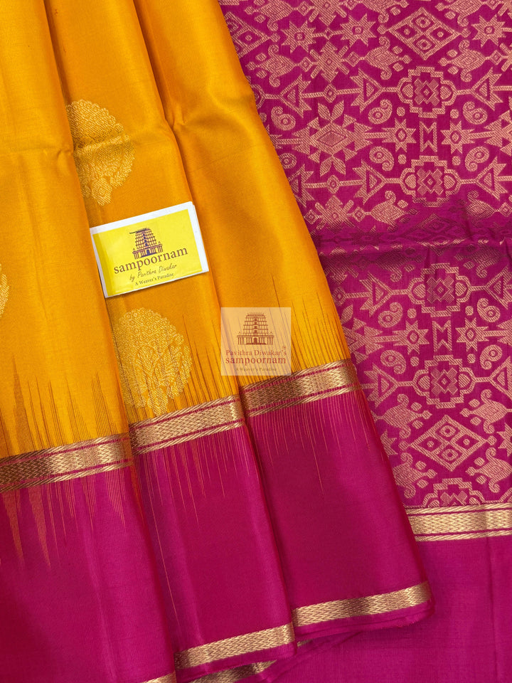 Mambazha Manjal with Rani Pink  , rich Zari butta in the body , rettapet boder  and grand  Pallu Pure Soft Silk Saree