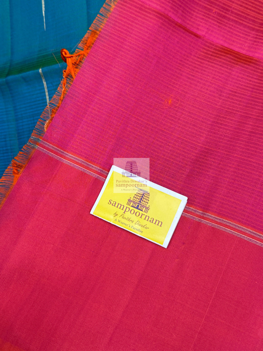 Ramar Green with Orangish Pink , Vairaoosi lines in the border ,  Zari butta in the body and grand  Pallu Pure Soft Silk Saree