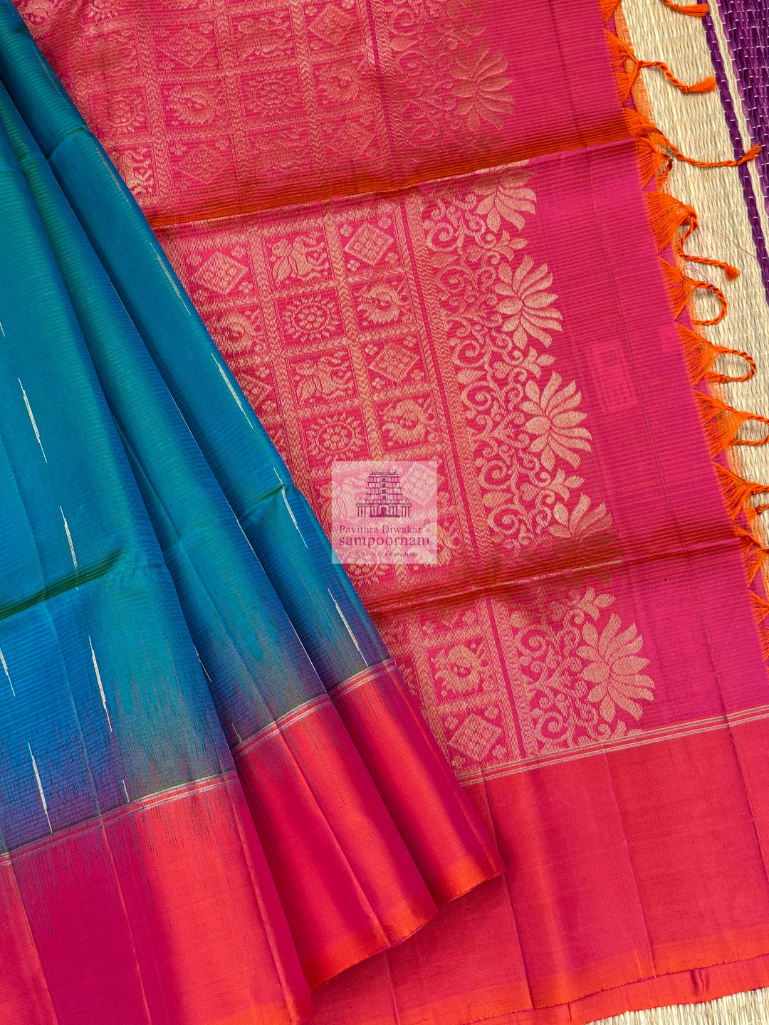 Ramar Green with Orangish Pink , Vairaoosi lines in the border ,  Zari butta in the body and grand  Pallu Pure Soft Silk Saree