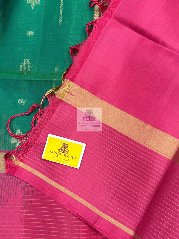 Ramar Green with Pink , Vairaoosi lines in the border , rich Zari butta in the body and grand  Pallu Pure Soft Silk Saree