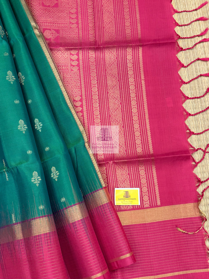 Ramar Green with Pink , Vairaoosi lines in the border , rich Zari butta in the body and grand  Pallu Pure Soft Silk Saree