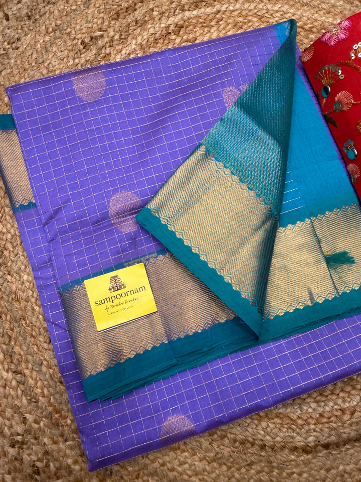 Lilac with Turquoise Blue , Zari Checks with  Mayil and  Chakram Butta in the Body, Traditional Borders and Rich Pallu Mayil Chakram Silk Cotton Saree
