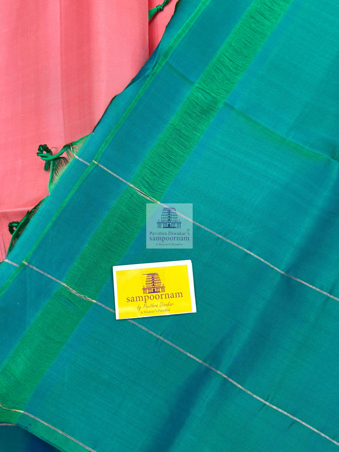 Baby Pink with Green , Vairaoosi lines in the border , rich Zari butta in the body and grand  Pallu Pure Soft Silk Saree