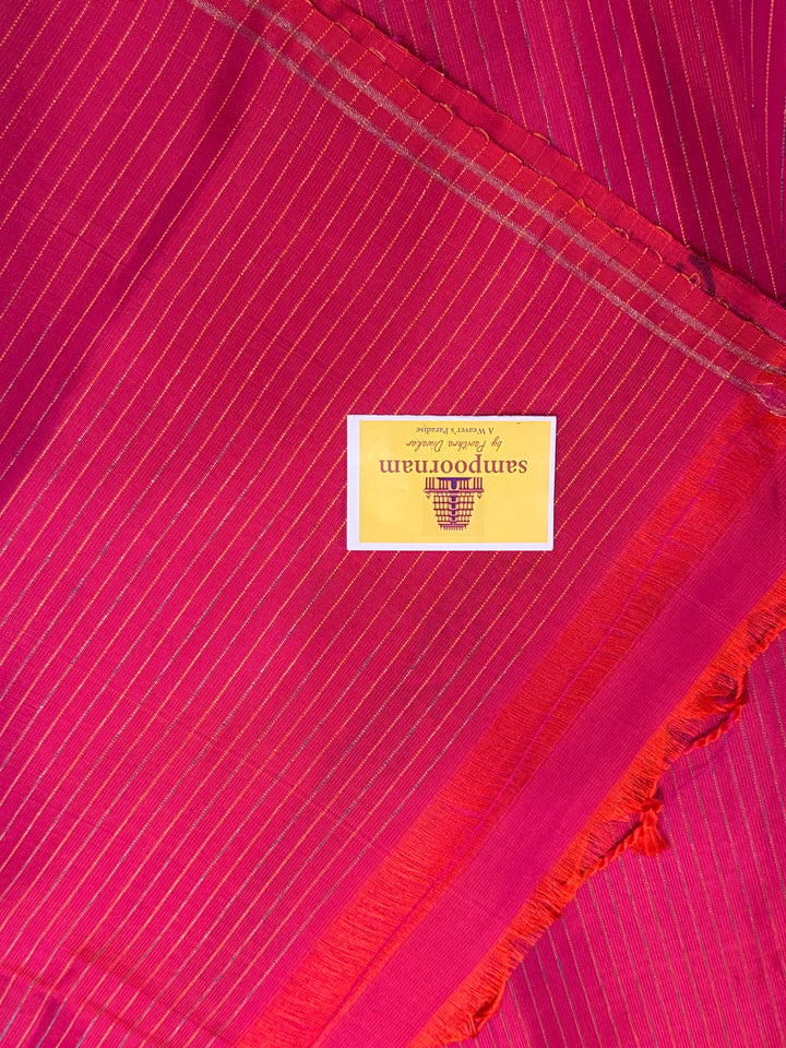 Light Blue with Orangish Pink , annam Handblock print in the body , simple zari lines in the Pallu and Blouse, pure soft silk saree