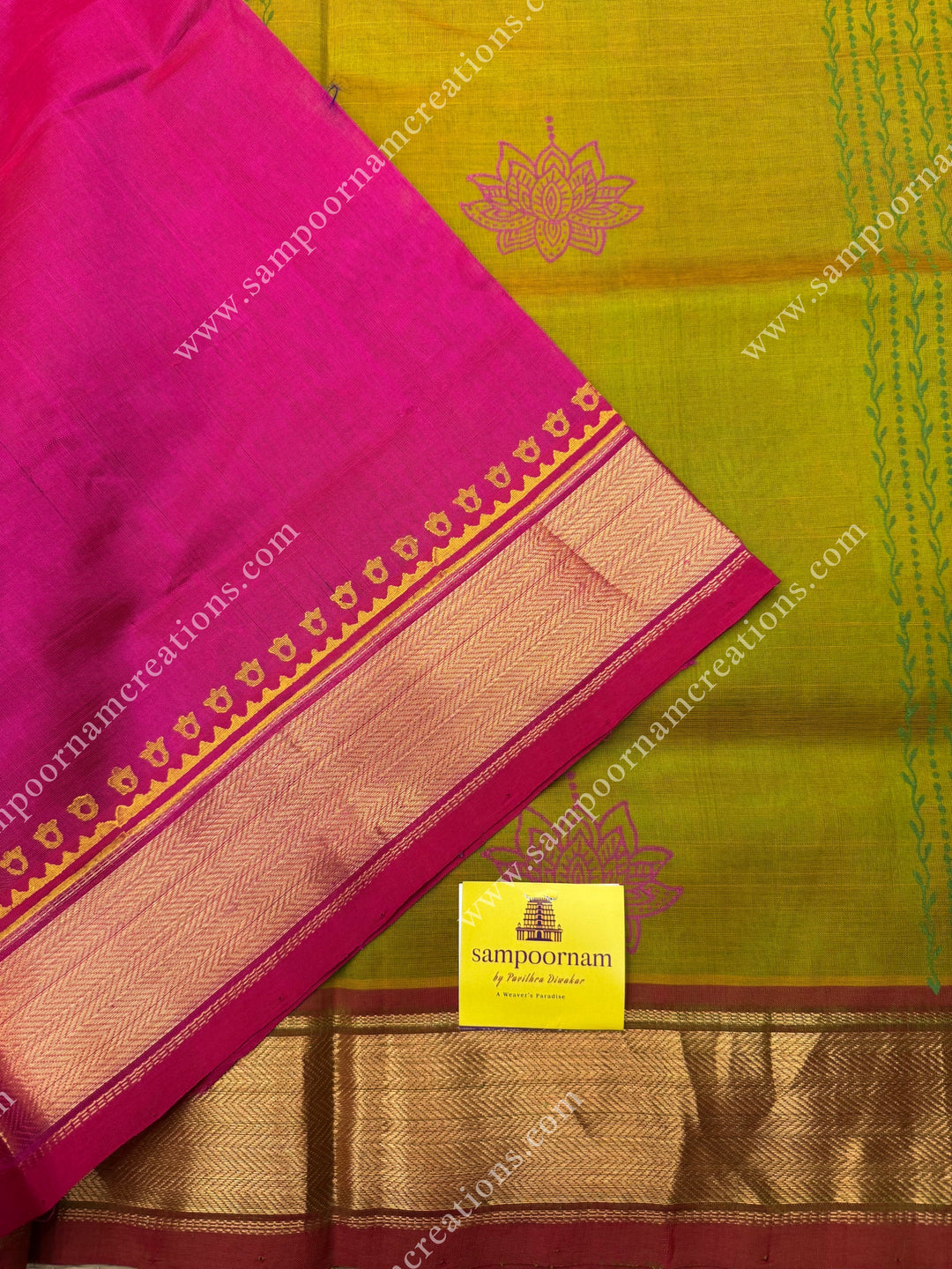 Manthulir Green with Rani Pink , Lotus motif in the body and  Rich Pallu Handblock Printed Silk Cotton Saree
