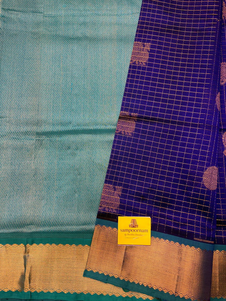 Blue with Turquoise Blue , Zari Checks with  Mayil and  Chakram Butta in the Body, Traditional Borders and Rich Pallu Mayil Chakram Silk Cotton Saree