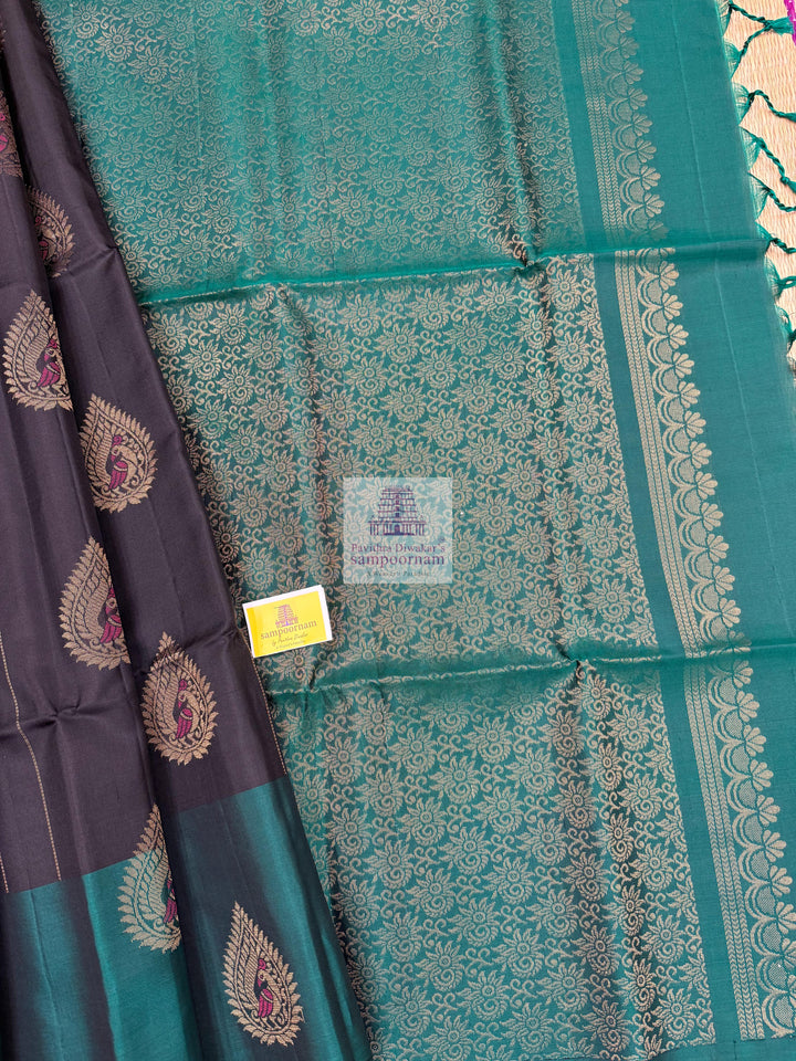 Black with Green , rich Zari butta in the body , rettapet border and grand  Pallu Pure Soft Silk Saree