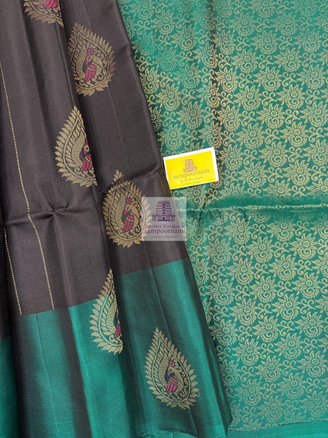 Black with Green , rich Zari butta in the body , rettapet border and grand  Pallu Pure Soft Silk Saree