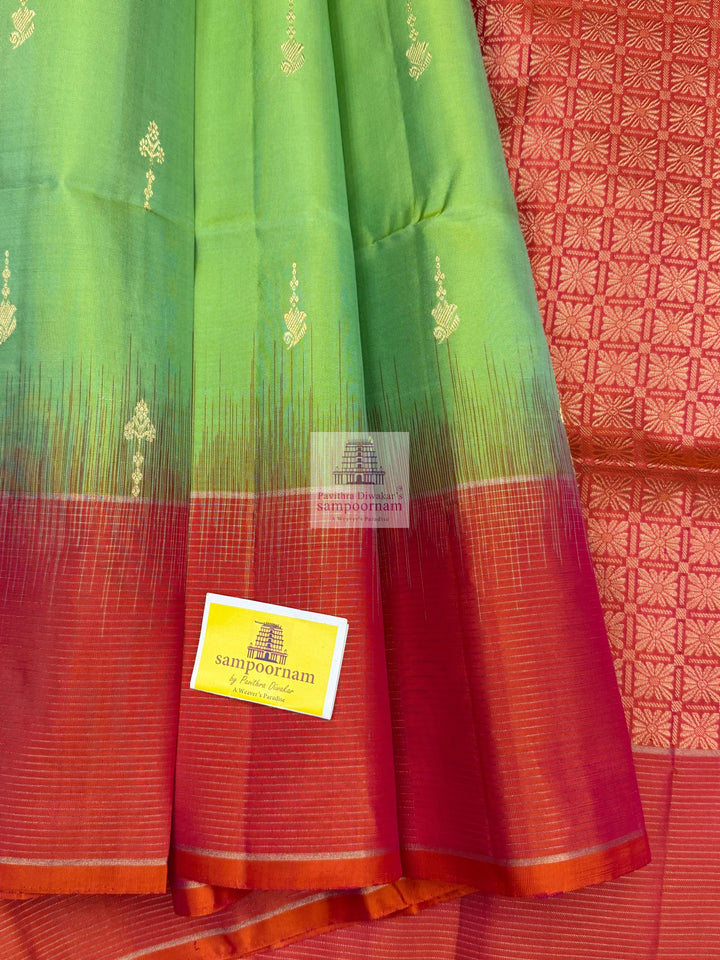 Pastel Green with Orangish Pink , Vairaoosi lines in the border , rich butta in the body Mambazha Manjal with Black , one side big border , rich Zari butta in the body and grand  Pallu Pure Soft Silk Saree