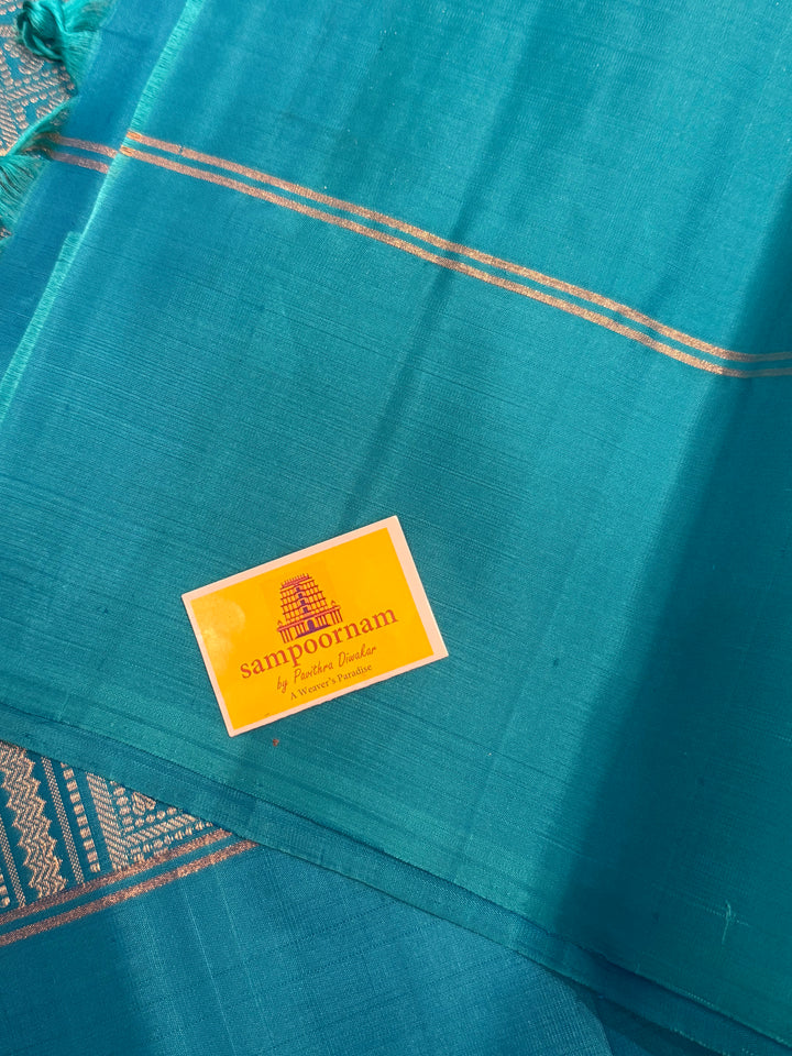 Lemon Yellow with Turquoise Blue rich Zari butta in silver and gold zari in the body , plain border and rich Pallu , pure soft silk saree