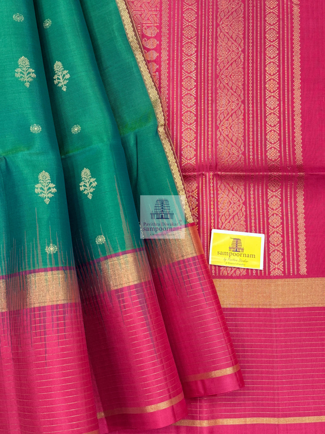 Ramar Green with Pink , Vairaoosi lines in the border , rich Zari butta in the body and grand  Pallu Pure Soft Silk Saree