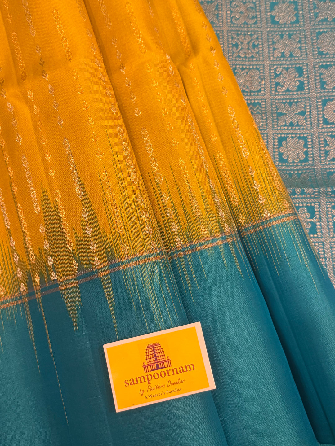 Lemon Yellow with Turquoise Blue rich Zari butta in silver and gold zari in the body , plain border and rich Pallu , pure soft silk saree