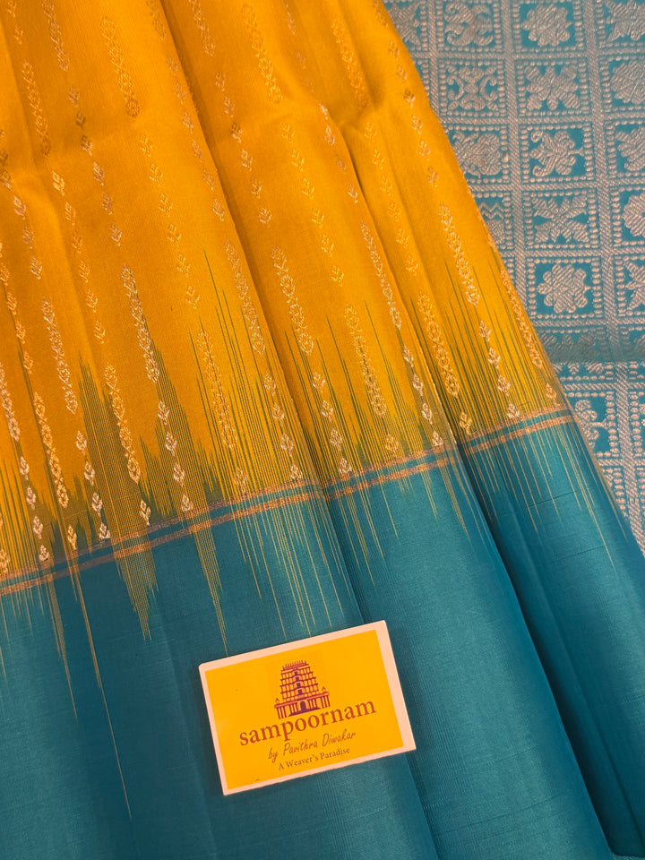 Lemon Yellow with Turquoise Blue rich Zari butta in silver and gold zari in the body , plain border and rich Pallu , pure soft silk saree