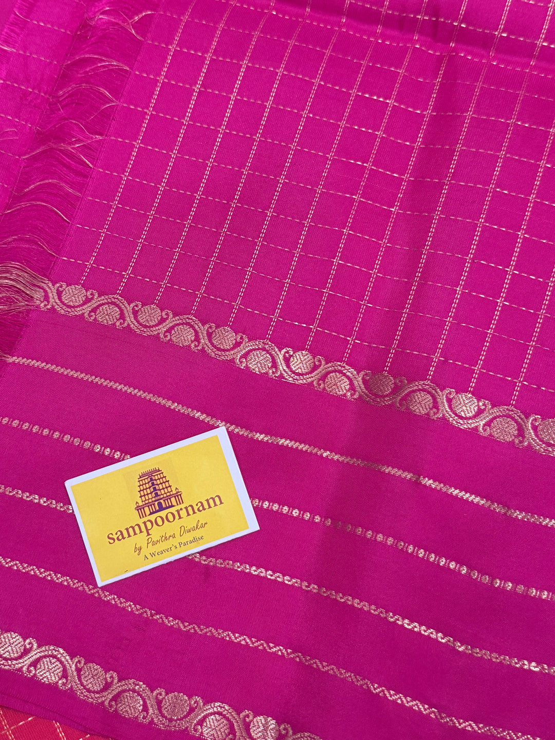 Reddish Pink with Rani Pink , rich Zari checks in the body , rettapet Veldari Zari lines in the border and rich Pallu , pure soft silk saree