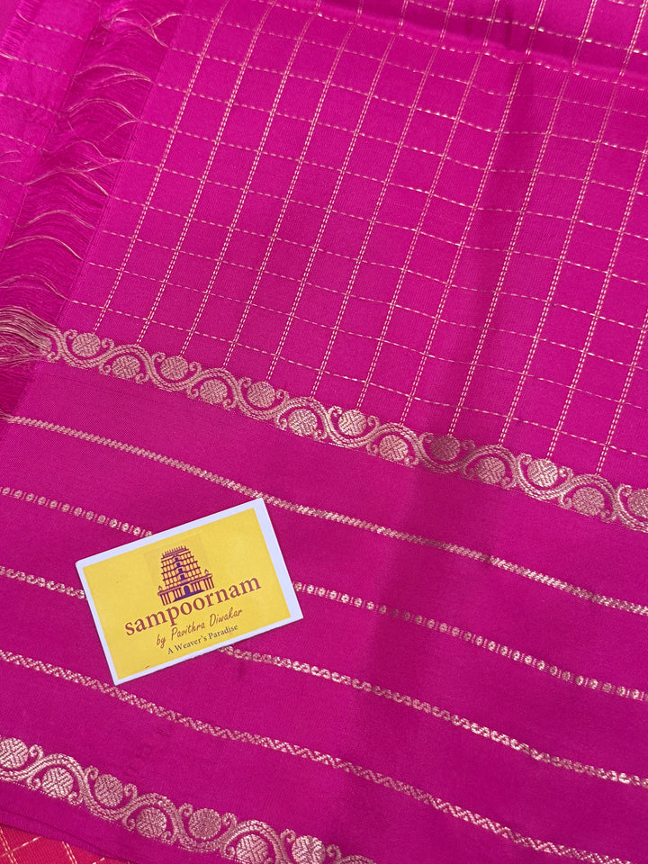 Reddish Pink with Rani Pink , rich Zari checks in the body , rettapet Veldari Zari lines in the border and rich Pallu , pure soft silk saree