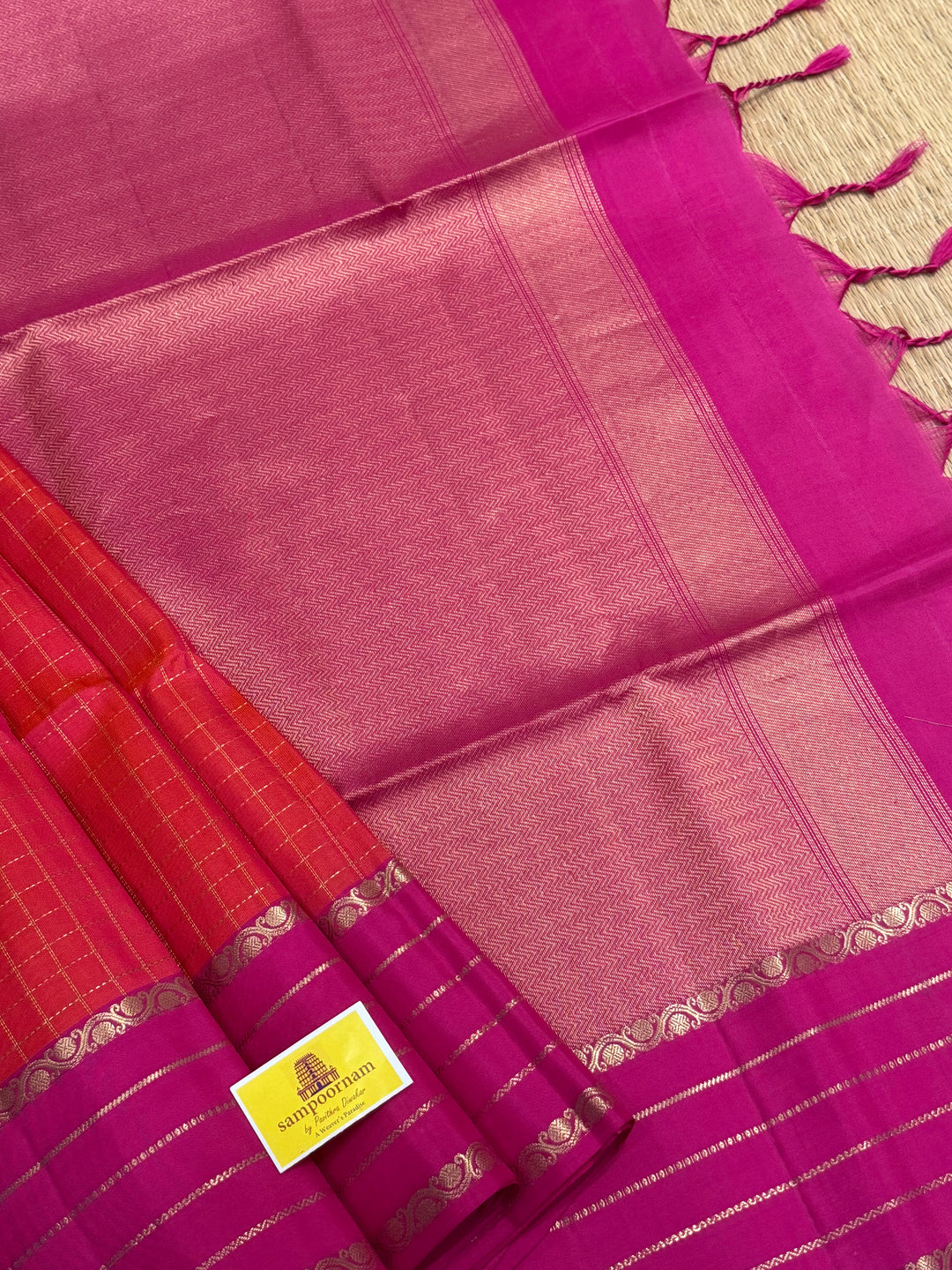 Reddish Pink with Rani Pink , rich Zari checks in the body , rettapet Veldari Zari lines in the border and rich Pallu , pure soft silk saree