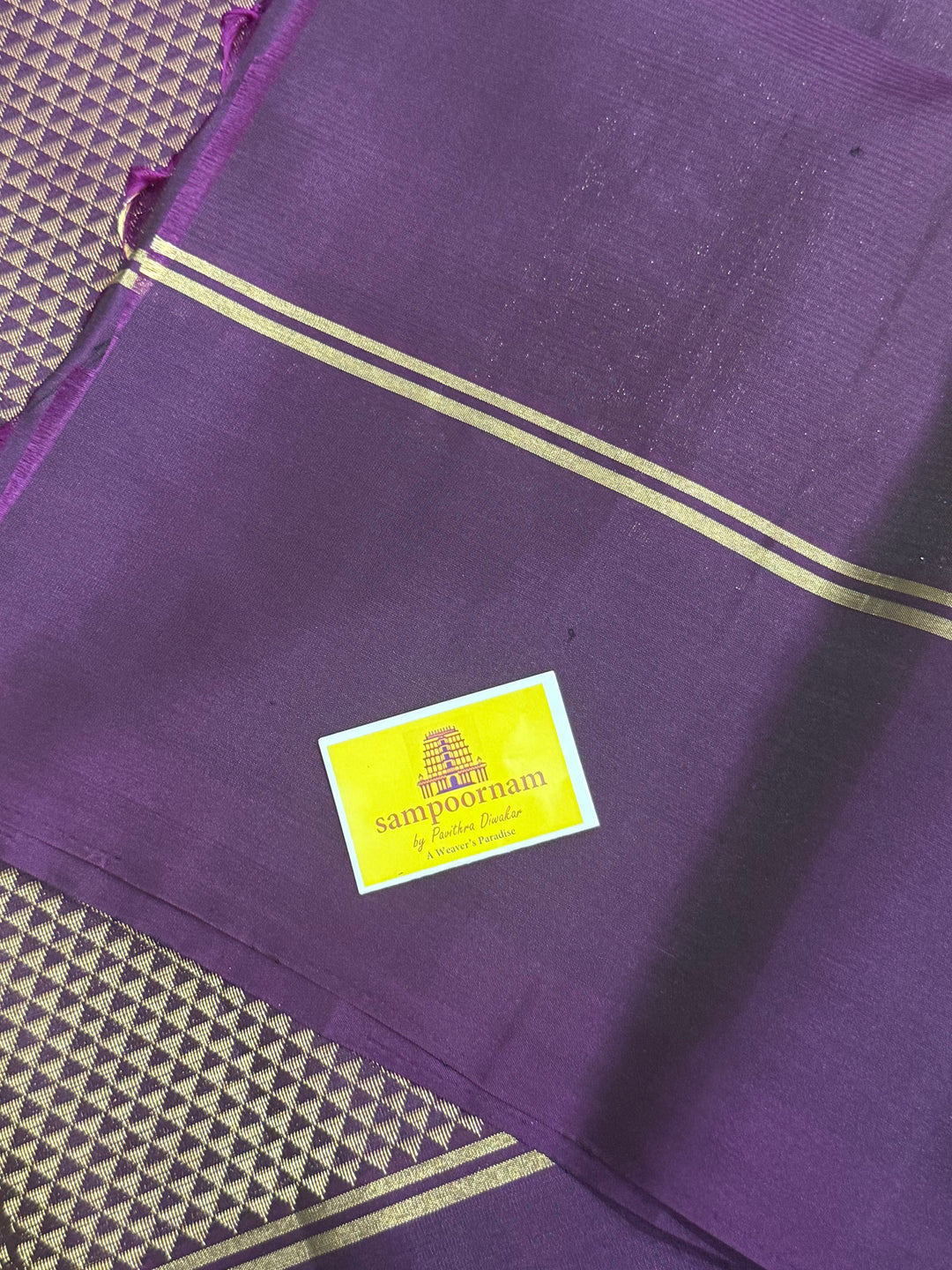 Lemon Yellow with Purple , rain drop zari butta in the body , plain borders and rich Pallu , pure soft silk saree