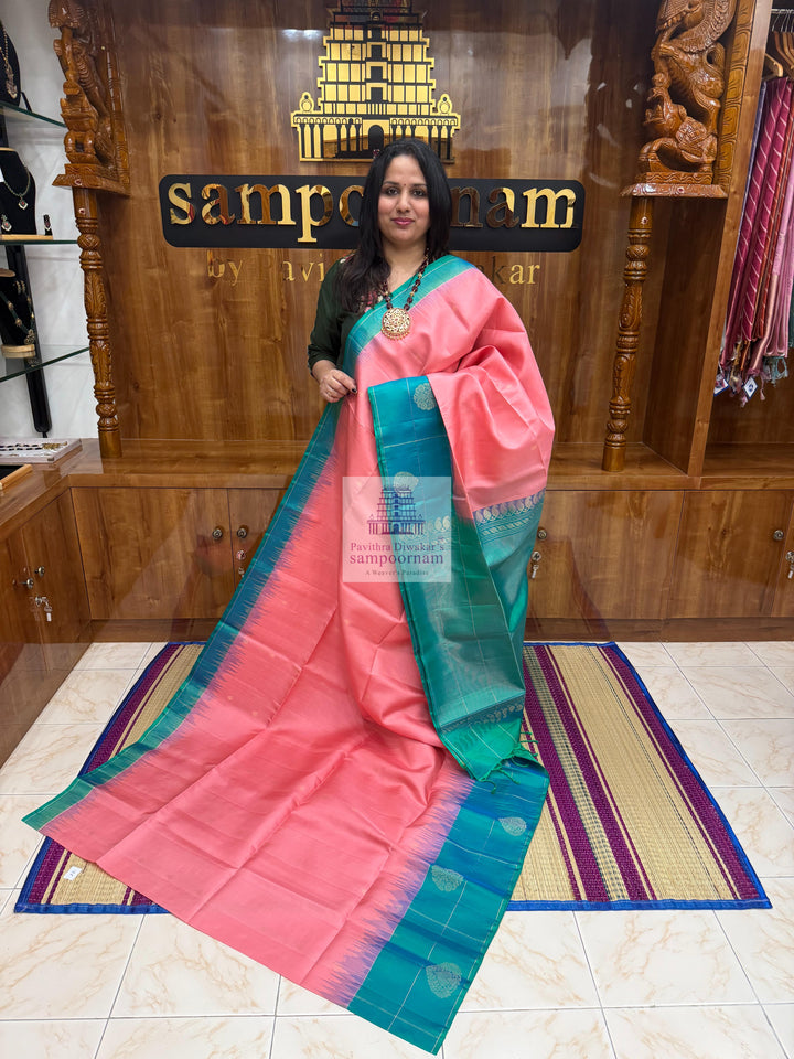 Baby Pink with Green , Vairaoosi lines in the border , rich Zari butta in the body and grand  Pallu Pure Soft Silk Saree