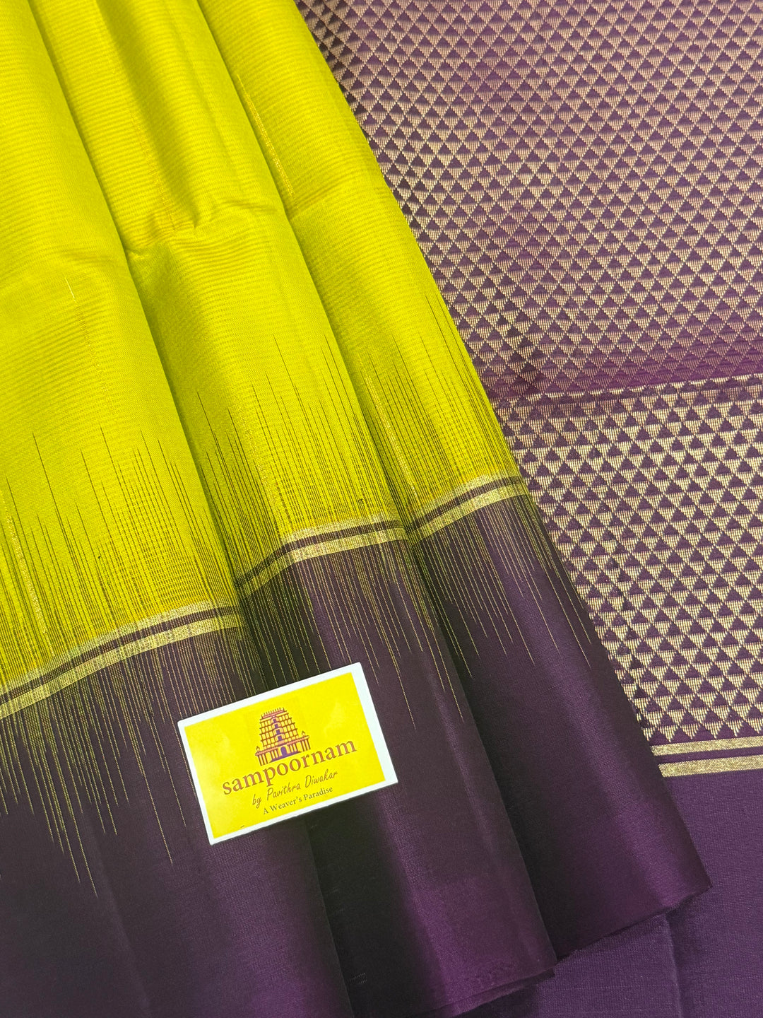 Lemon Yellow with Purple , rain drop zari butta in the body , plain borders and rich Pallu , pure soft silk saree