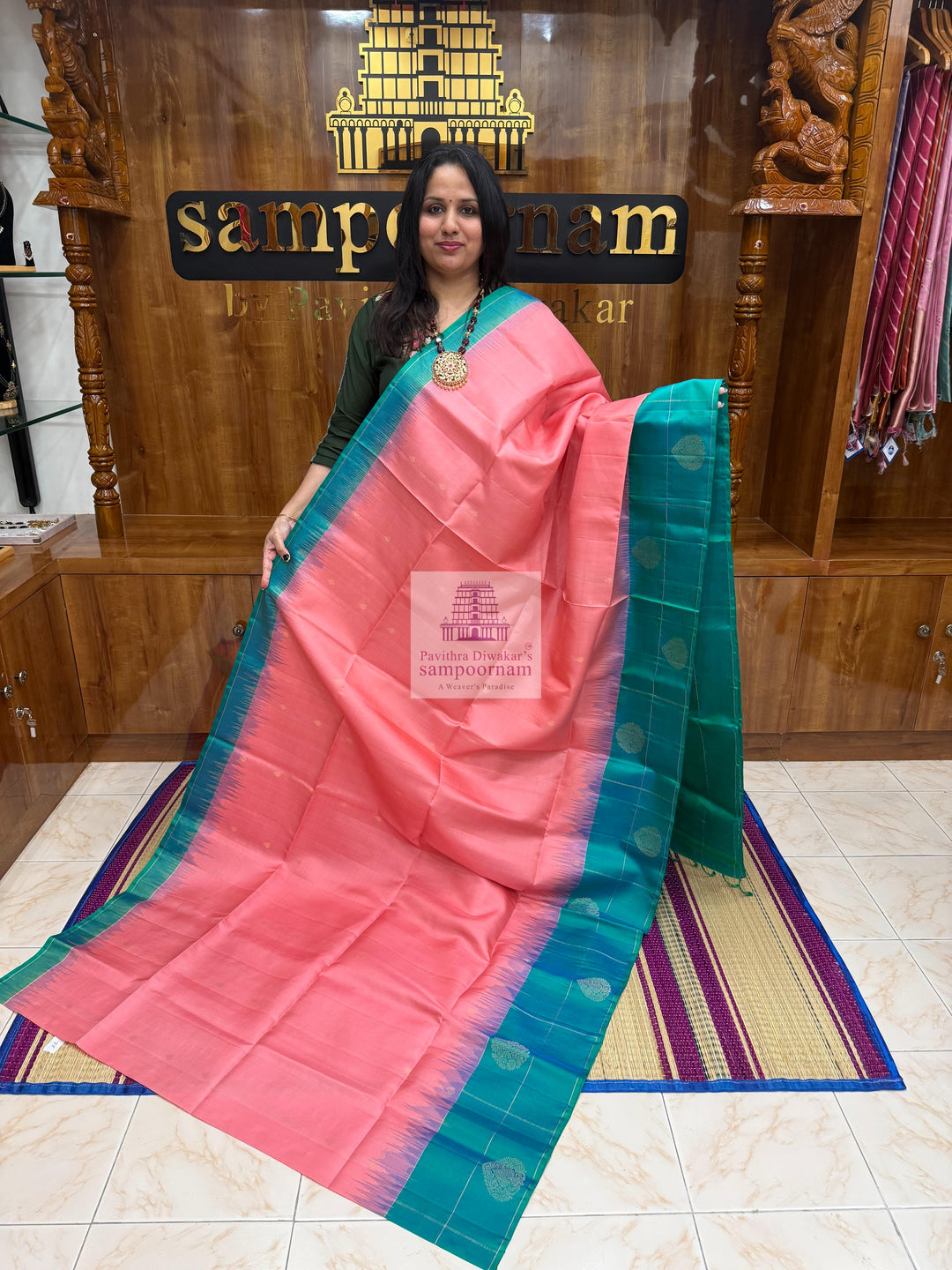 Baby Pink with Green , Vairaoosi lines in the border , rich Zari butta in the body and grand  Pallu Pure Soft Silk Saree
