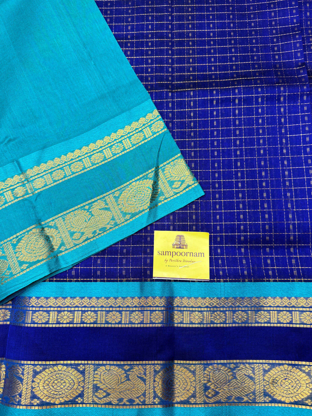 Blue with Turquoise Blue , Zari  butta in the body , rettapet  border and rich Pallu Lakshadeepam Silk Cotton Saree