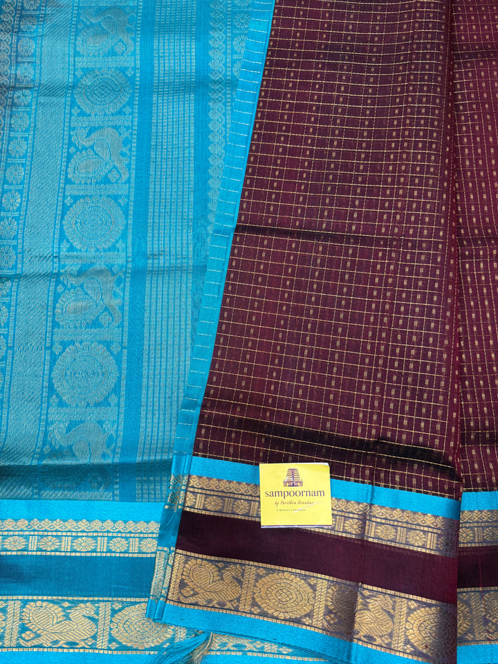 Dark Arakku with Turquoise Blue , Zari  butta in the body , rettapet  border and rich Pallu Lakshadeepam Silk Cotton Saree