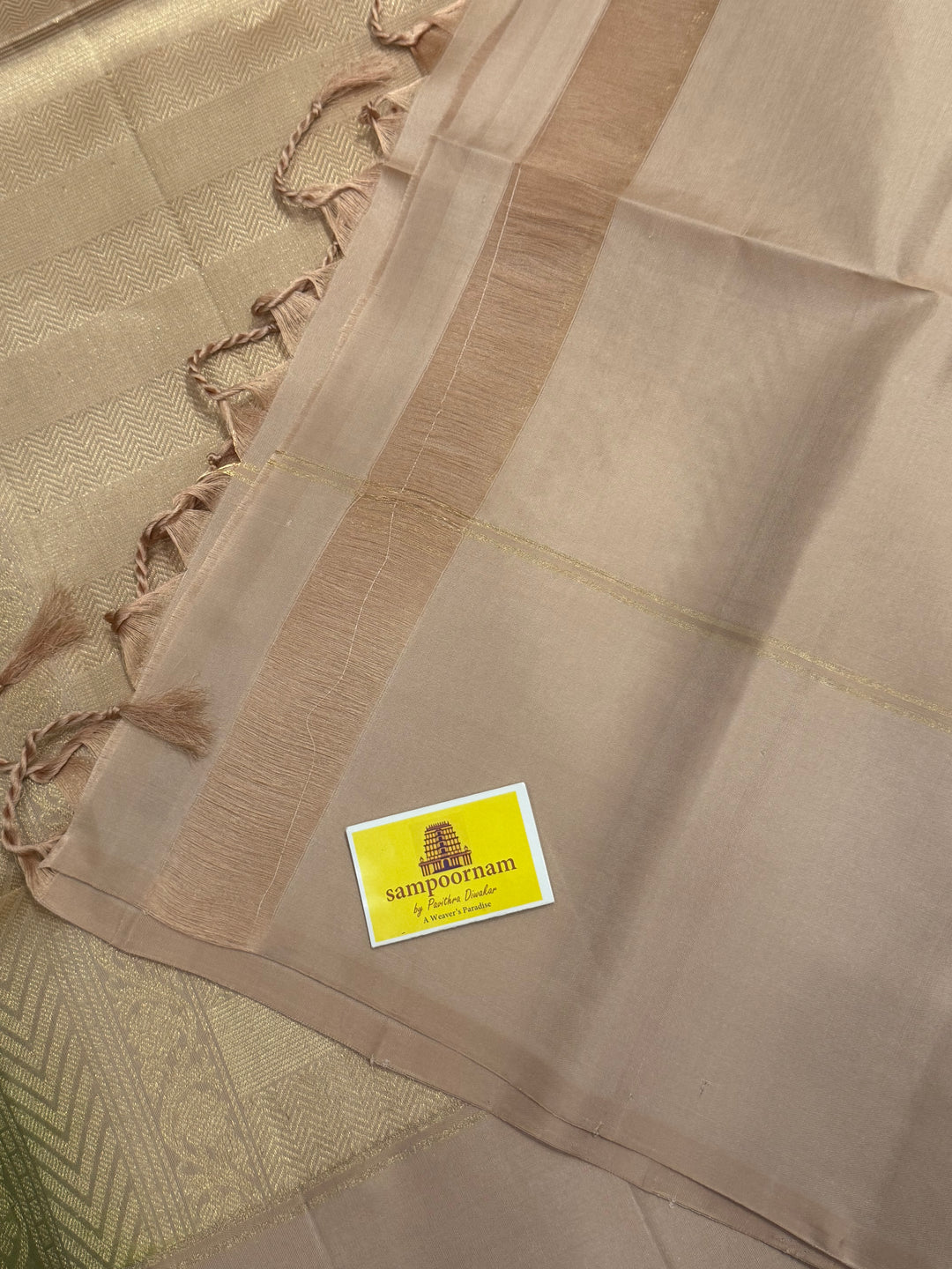 Light Green with Beige rich zari butta in the body , plain borders and rich Pallu , pure soft silk saree