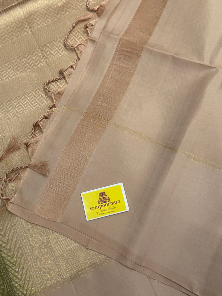 Light Green with Beige rich zari butta in the body , plain borders and rich Pallu , pure soft silk saree