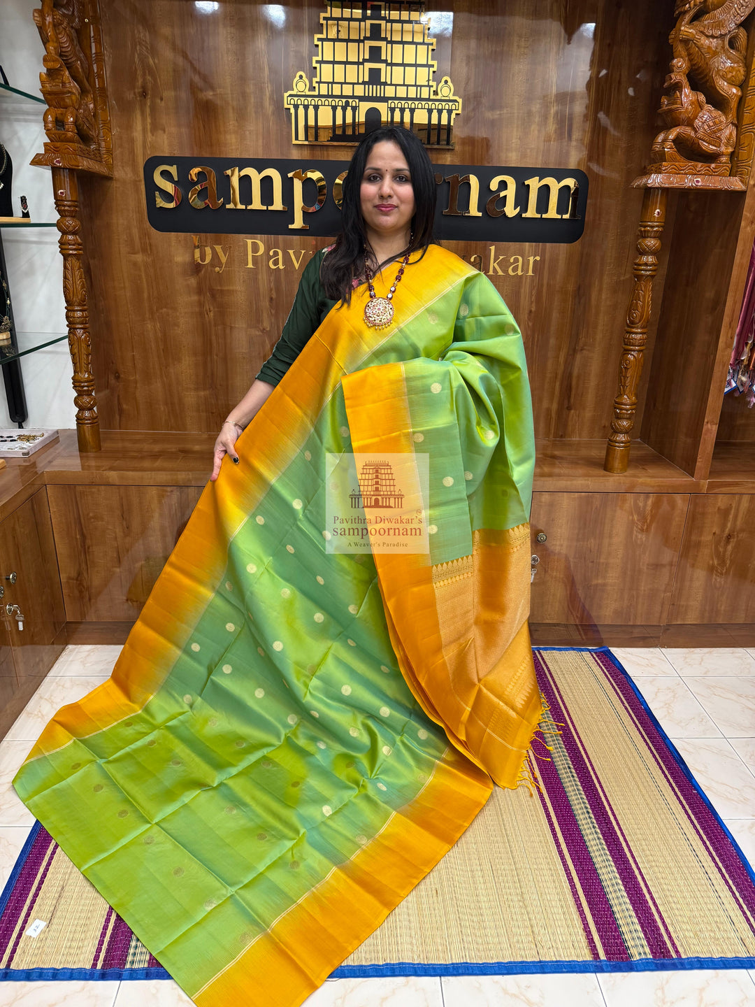 Pastel Green with Mustard ,  Vairaoosi lines in the border , Annam and Chakram butta in the body and rich Pallu Pure Soft Silk Saree