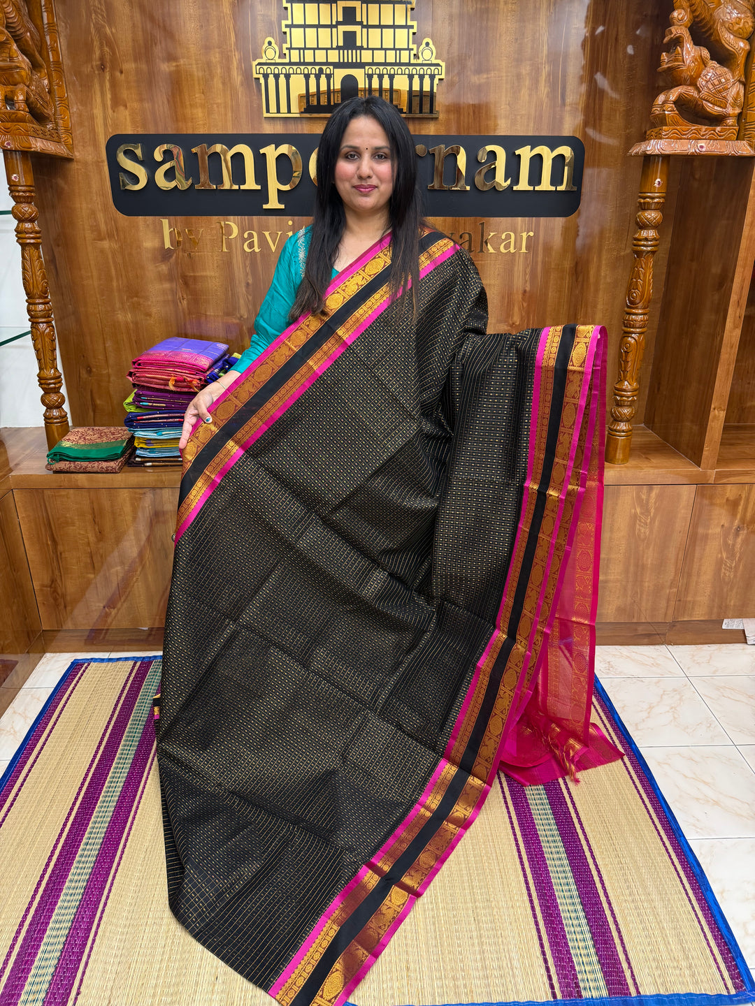 Black with Pink , Zari  butta in the body , rettapet  border and rich Pallu Lakshadeepam Silk Cotton Saree