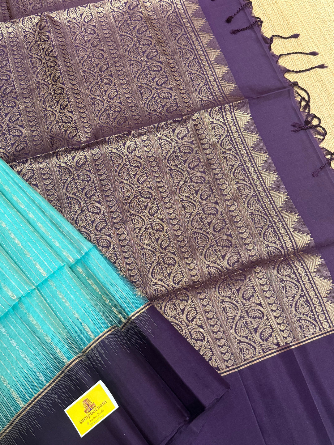 Pastel Light Blue with Purple , rich zari gold and silver zari butta in the body and grand  Pallu , pure soft silk saree