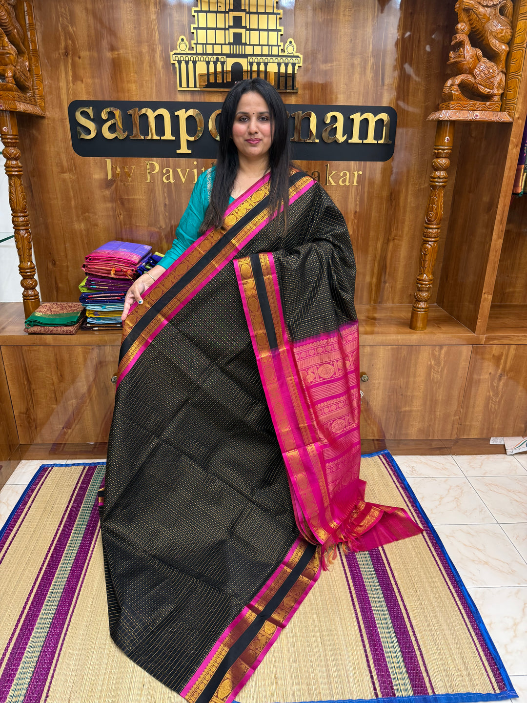 Black with Pink , Zari  butta in the body , rettapet  border and rich Pallu Lakshadeepam Silk Cotton Saree