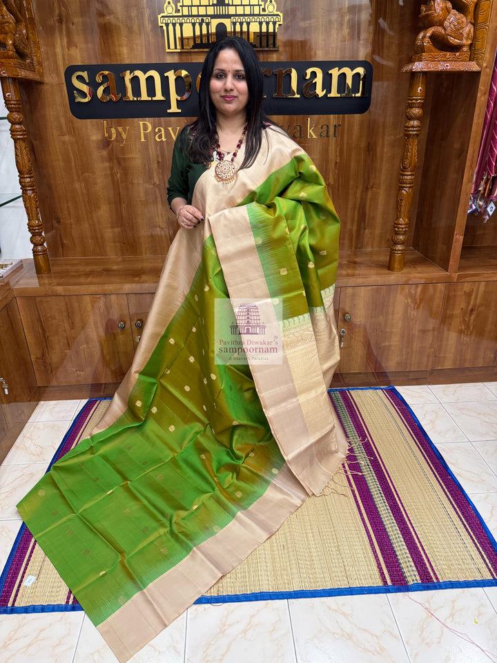 Manthulir Green with Beige ,  Vairaoosi lines in the border , Annam and Chakram butta in the body and rich Pallu Pure Soft Silk Saree