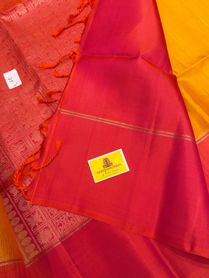 Manjal with Reddish Pink , rich zari checks in the body , vairaoosi lines in the border and rich Pallu , pure soft silk saree