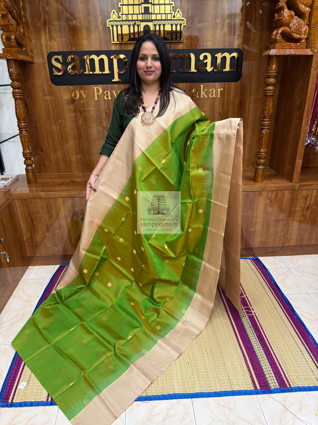 Manthulir Green with Beige ,  Vairaoosi lines in the border , Annam and Chakram butta in the body and rich Pallu Pure Soft Silk Saree