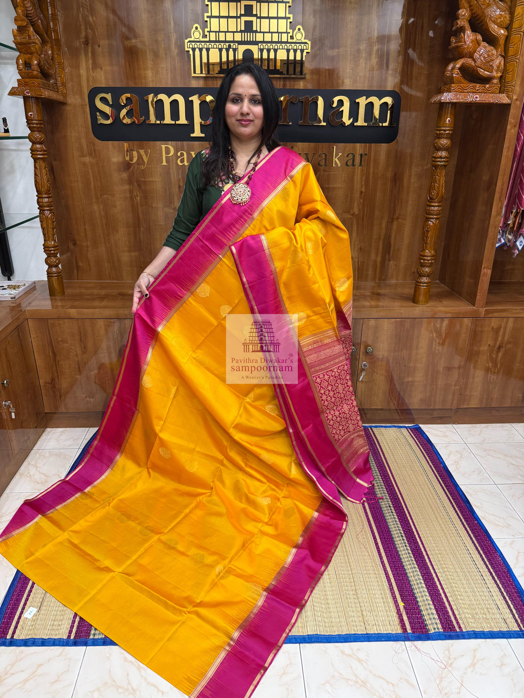 Mambazha Manjal with Rani Pink  , rich Zari butta in the body , rettapet boder  and grand  Pallu Pure Soft Silk Saree