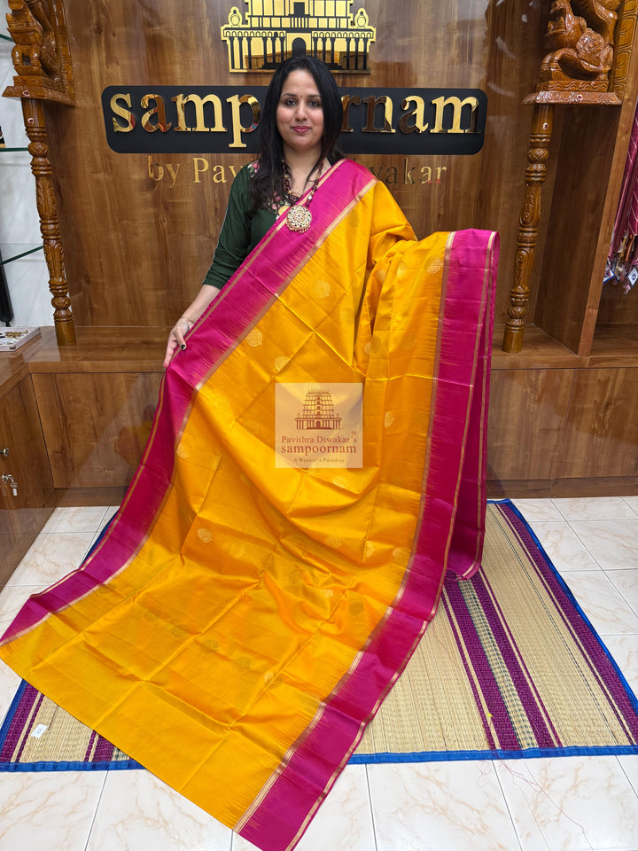 Mambazha Manjal with Rani Pink  , rich Zari butta in the body , rettapet boder  and grand  Pallu Pure Soft Silk Saree